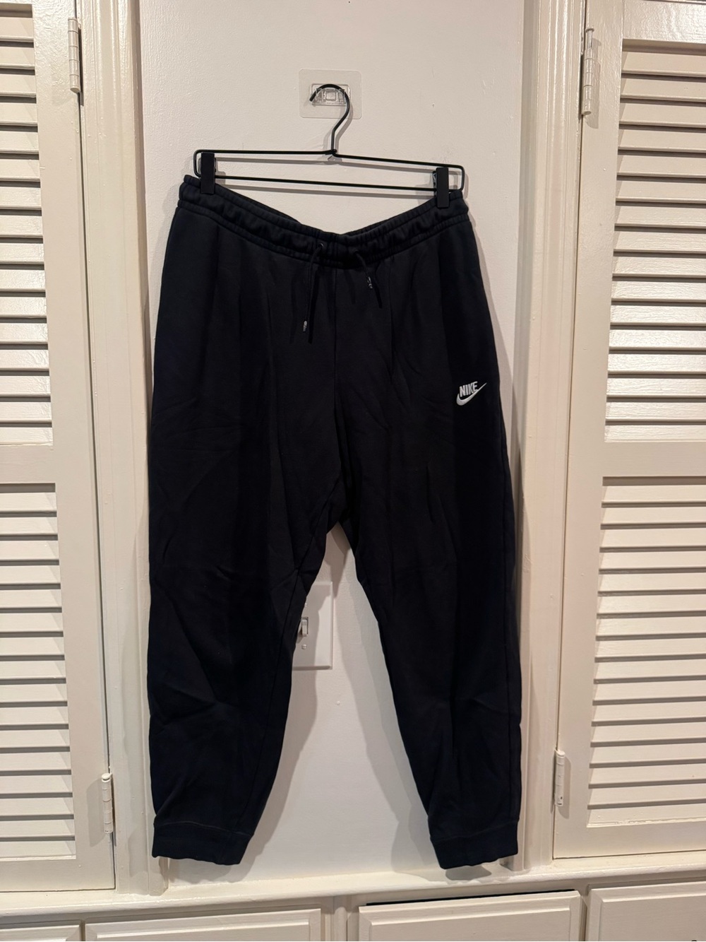 Nike womans Black Jogger Sweatpants with White Swoosh
